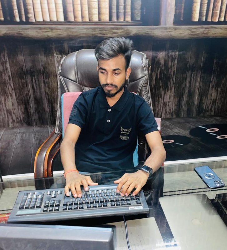 Maniv Romeo, founder of Shootup Media, at his desk